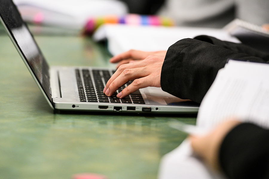 Person typing on a computer
